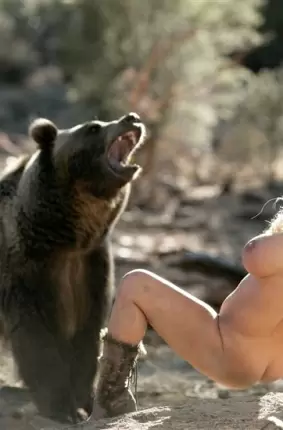 Images 30 - Грудастая развратница позирует рядом с диким медведем 